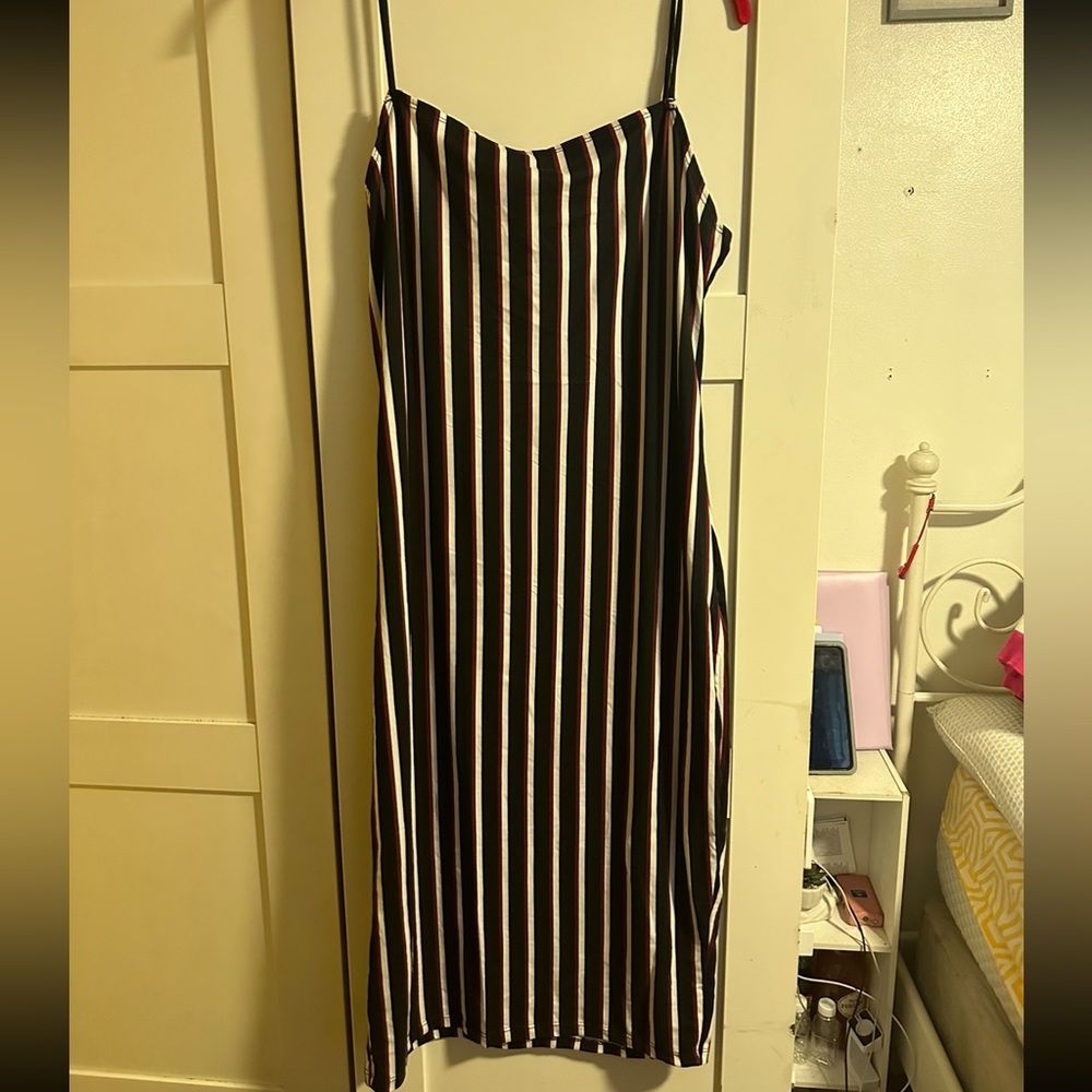Some dress, white, black and red stripes size extra large, never worn.